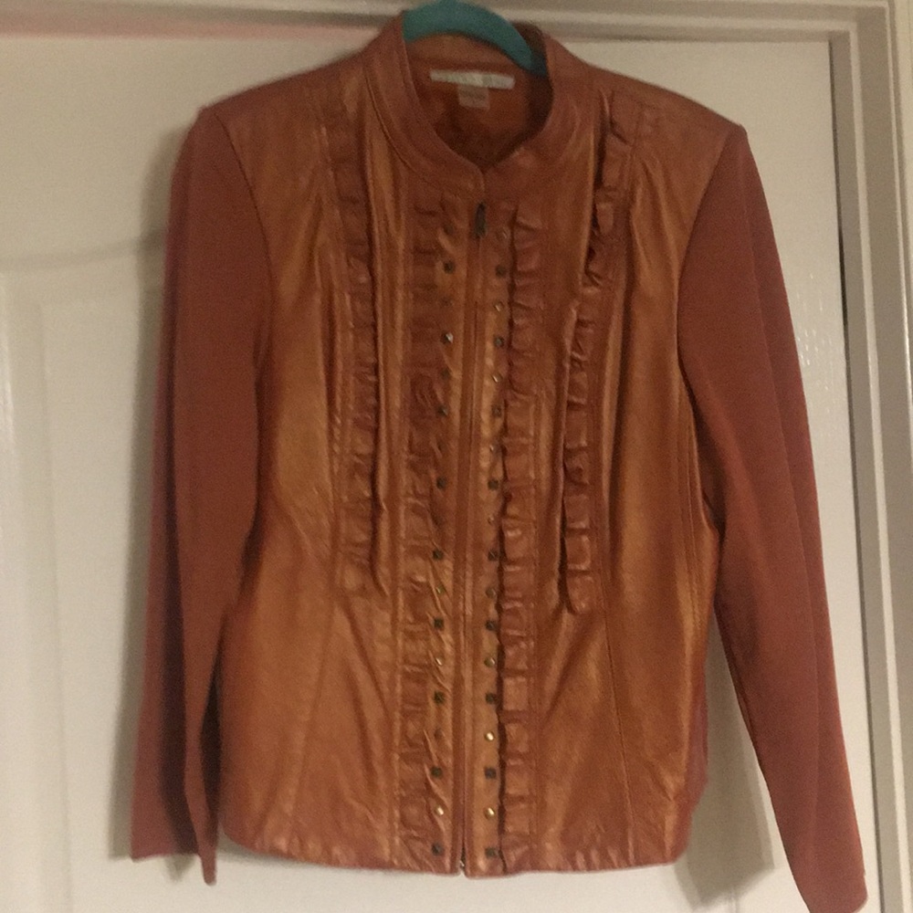 Peter Nygard orange jacket